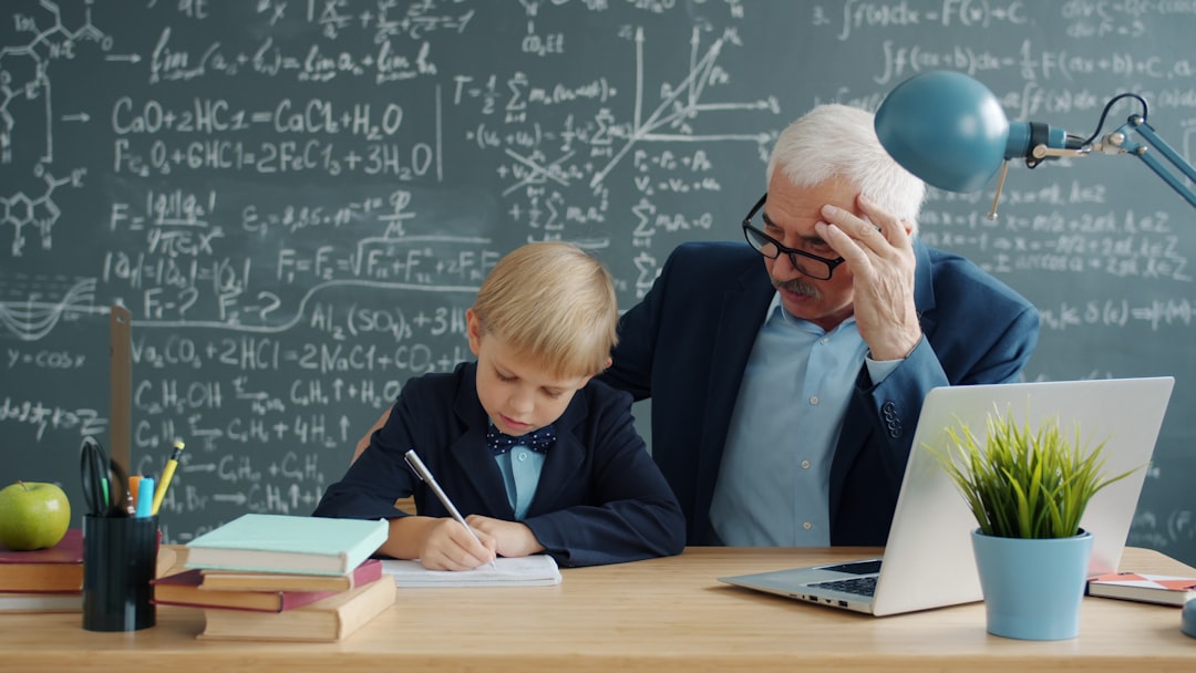Teacher helping student